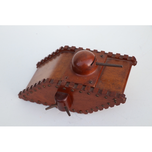 92 - A large wooden trench art money box in the form of a WWI tank, approx 26cms long and other items of ... 