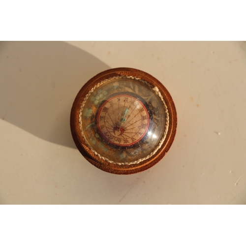 276 - An 18th century French pocket sundial compass with painted paper dial under a glass dome within a tr... 