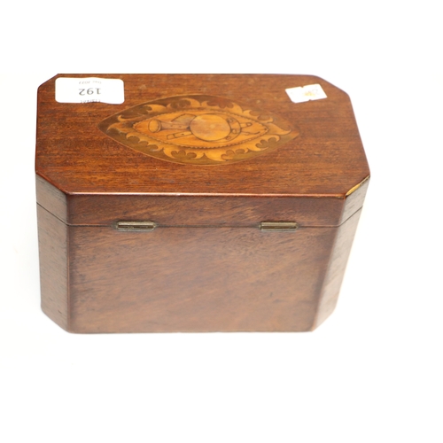 192 - A Regency mahogany two-division tea caddy with shell inlay decoration, 18cms wide.