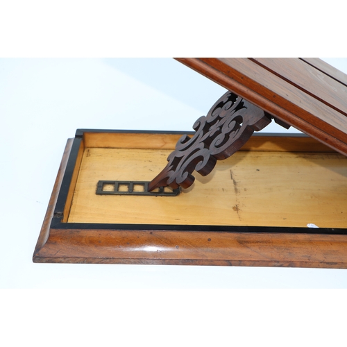 283 - A Victorian figured walnut stereoscopic table top card viewer, 61cms long.