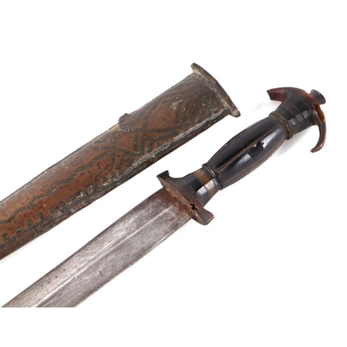 124 - A North African tribal dagger with horn handle and metal scabbard, 57cms long; together with a woode... 