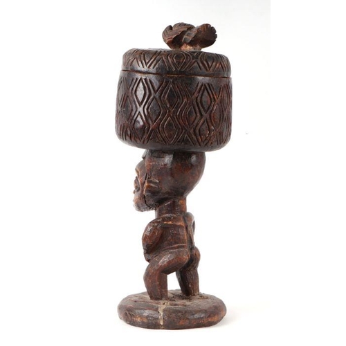 129 - An African tribal Bamileke Cameroon bowl bearer carved wooden figure, approx 53cms high.