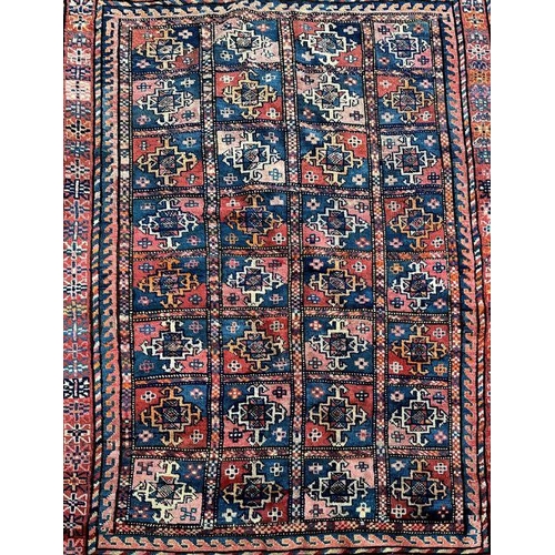 165 - A West Turkmenistan Tekke rug with a field of aina kochak guls, 164 by 244cms.