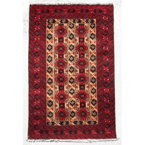 193 - A Persian Hamadan woollen runner with repeated guls on a red ground, 206 by 125cms (10).