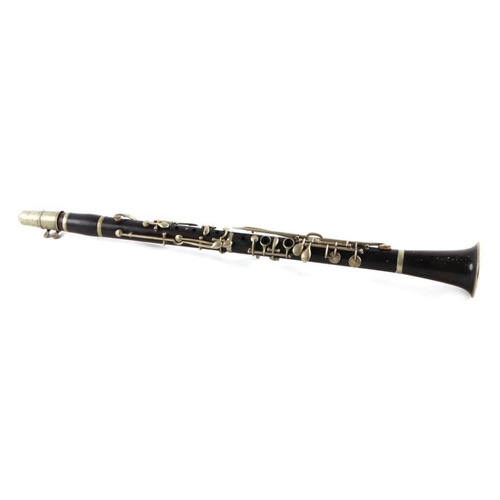 22 - A rosewood four-piece clarinet, 66cms long.