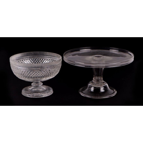 299 - A cut glass footed bowl with hobnail cut decoration, 19cms diameter; together with a similar dish, 2... 