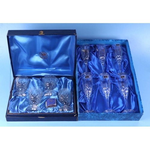 306 - A boxed set of six Doulton International Crystal wine flutes; together with a boxed set of Thomas We... 