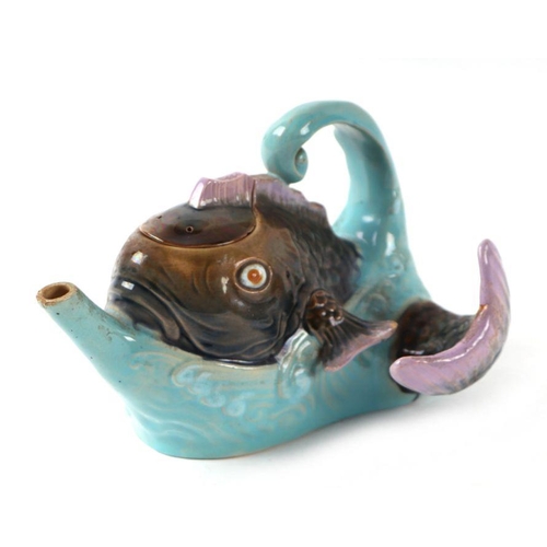 343 - A late Victorian Brownfield majolica teapot and cover in the form of a fish jumping out of the sea, ... 