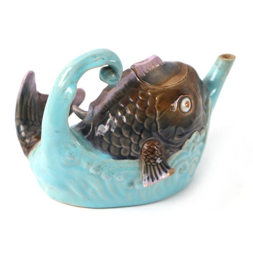 343 - A late Victorian Brownfield majolica teapot and cover in the form of a fish jumping out of the sea, ... 