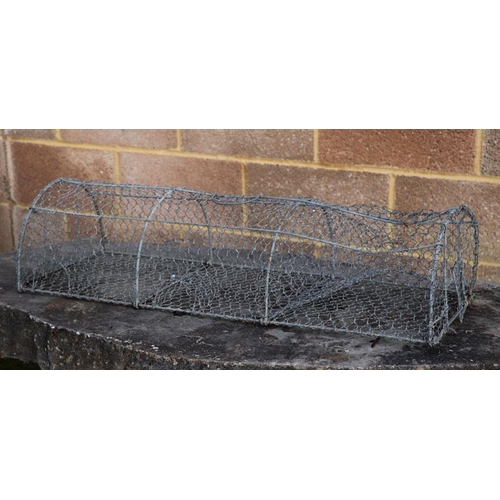 4 - A wirework crayfish trap, 90cms long; together with two shooting sticks, both with leather seats (3)... 