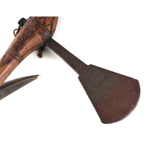 53 - An African tribal axe with carved wood shaft, 59cms long; together with an Indian zhaghnal (2).