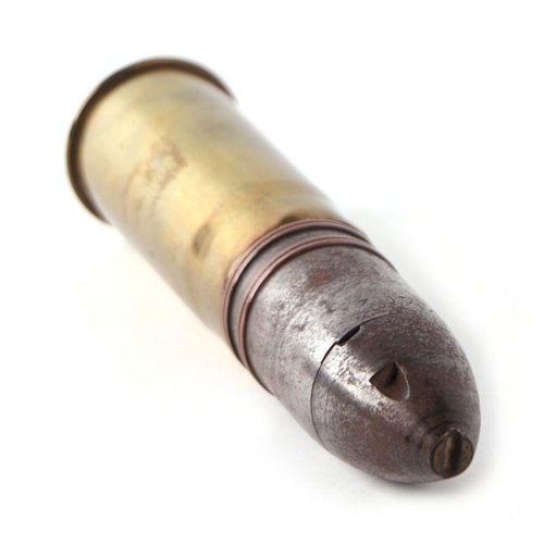 75 - A complete inert WW1 artillery shell and brass casing in two parts. Date stamp to the head for 1. 17... 