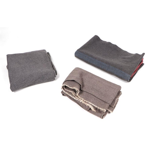 95 - A quantity of assorted military woollen blankets and camouflage netting.