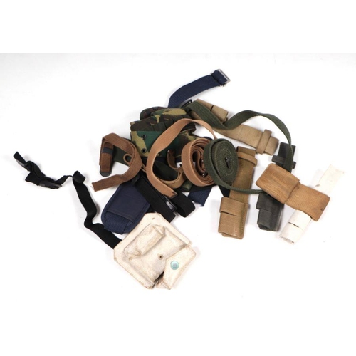 96 - A quantity of assorted military webbing items to include haversacks, kit bags and other similar item... 