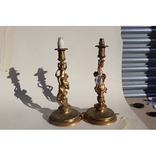 135 - A pair of gilt bronze figural table lamps, the columns in the form of neo-classical figures, each 41... 