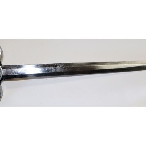 106 - A replica Nazi dress dagger, the blade marked 'Solingen Waffen' in scabbard, 43cms long.