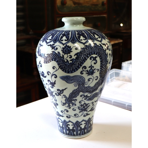 734 - A large Chinese blue & white Meiping vase decorated with a dragon amongst scrolling foliage, six... 