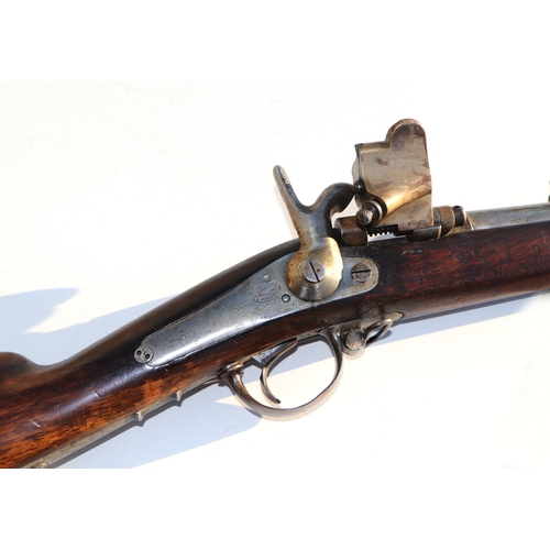 45 - A 19th century French percussion rifle with sprung lever breach barrel, suspension loops and bayonet... 