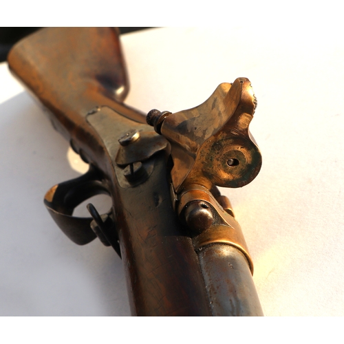 45 - A 19th century French percussion rifle with sprung lever breach barrel, suspension loops and bayonet... 