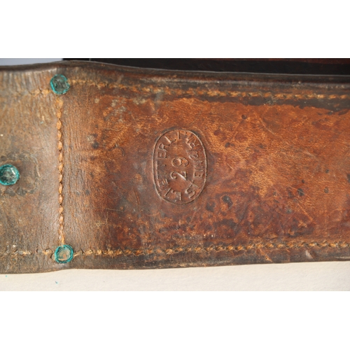 77 - Swiss Army leather ammunition pouch or cartridge case 22.5cms (8.875ins) wide, stamped to the revers... 