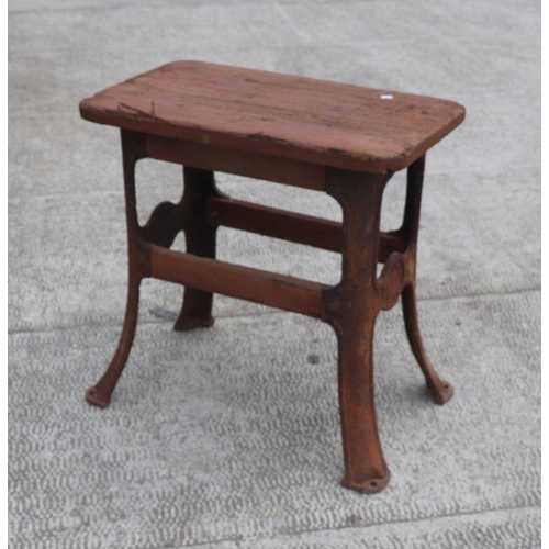 10 - An Industrial machinist type cast iron table with rectangular wooden top, 68cms wide.