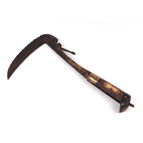 102 - An Afghan Lahore folding axe with bone handle, 30cms long.