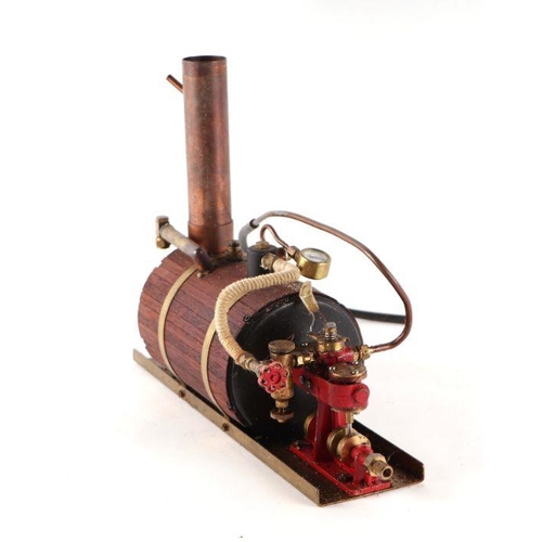 124 - A Steam Plant with brass bound coopered barrel, traditional gauges and copper funnel, 126cms long.