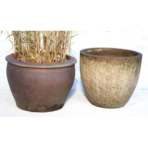 22 - A large garden pot, 60cms diameter; together with another similar, 48cms diameter, one planted with ... 