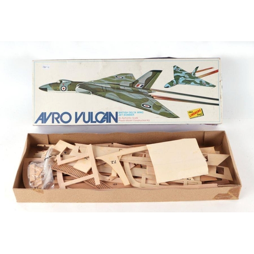 220 - A Micro-Mold Avoncraft Cub Glider, boxed, a Keil Kraft De Havilland Tiger Moth kit and an Avro Vulca... 