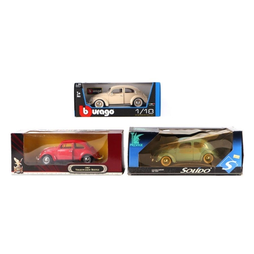 227 - Three 1/18 scale diecast cars comprising Bburago Volkswagen Kafer Beetle, Prestige Volkswagen Beetle... 