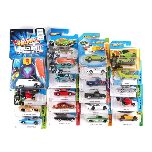 243 - A collection of Hot Wheels blister packs including Morris Mini, Lotus Esprit S1, 68 Shelby GT500, 55... 