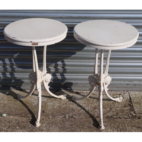 26 - A pair of Coalbrookdale style painted cast iron side tables, each with circular wooden tops, 45cms d... 