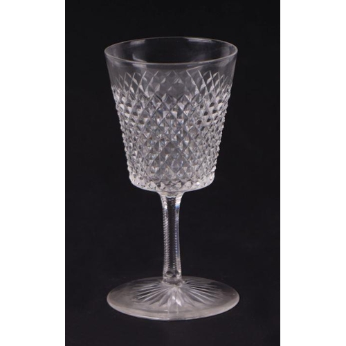 427 - An extensive suite of cut glassware to include wine glasses, sherry glasses, tumblers and finger bow... 