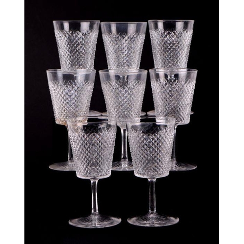 427 - An extensive suite of cut glassware to include wine glasses, sherry glasses, tumblers and finger bow... 