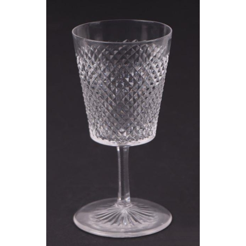 427 - An extensive suite of cut glassware to include wine glasses, sherry glasses, tumblers and finger bow... 