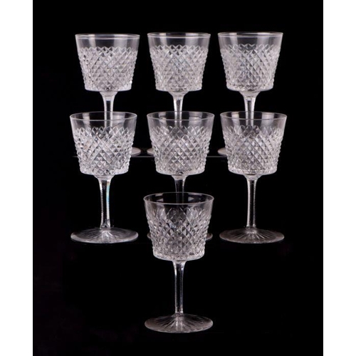 427 - An extensive suite of cut glassware to include wine glasses, sherry glasses, tumblers and finger bow... 