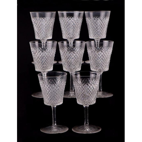 427 - An extensive suite of cut glassware to include wine glasses, sherry glasses, tumblers and finger bow... 