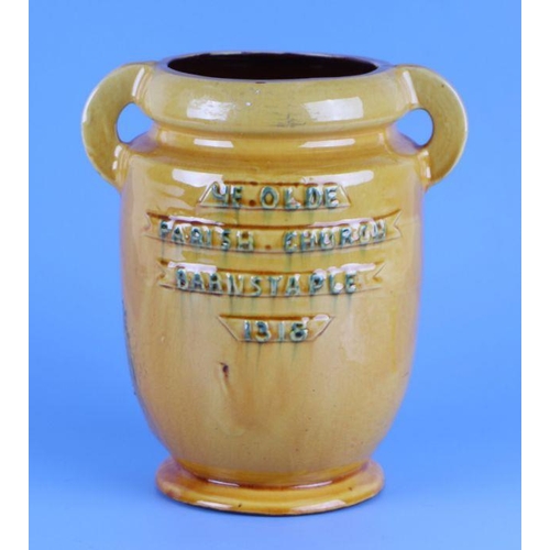 437 - A C H Brannan pottery two-handled vase decorated in relief with 'Ye Olde Parish Church Barnstaple 18... 