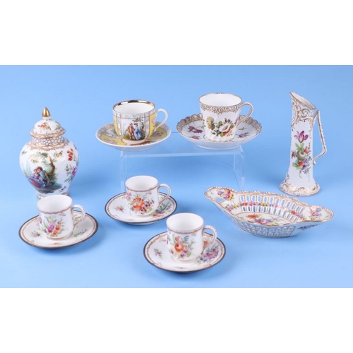 451 - A quantity of Dresden and similar porcelain to include vase and cover, tea cups and figures.