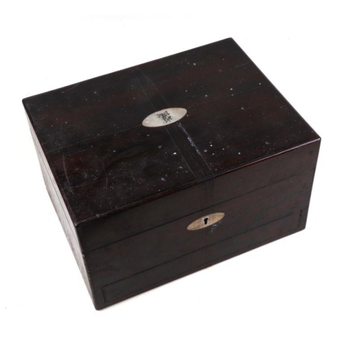 505 - A Victorian rosewood dressing table box with fitted interior and secret drawer containing some dress... 