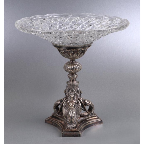 548 - A silver plated meat dome; together with entree dish and cover, a silver plated centrepiece with car... 