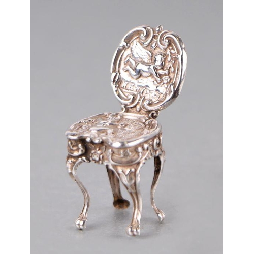 565 - An Edwardian silver novelty miniature Queen Anne style chair, Birmingham 1901, 5g.