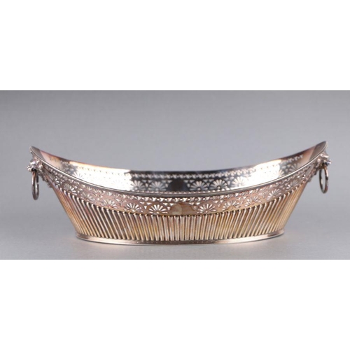 571 - A Victorian pierced silver bread basket with lion mask loop handles, Sheffield 1899 and maker's mark... 