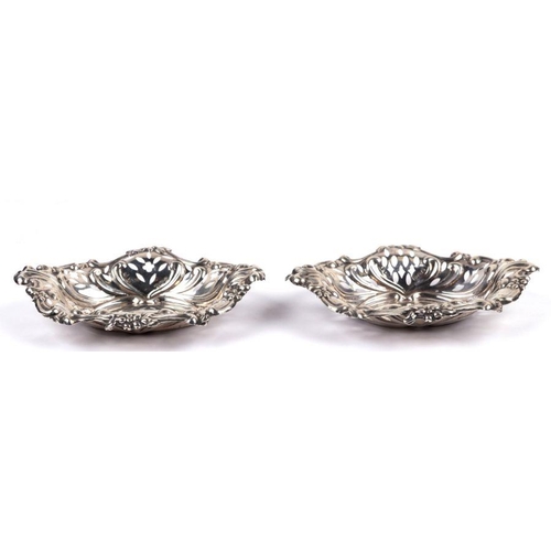 608 - A pair of Victorian pierced silver bonbon dishes, Birmingham 1896, 12cms wide, 53g.