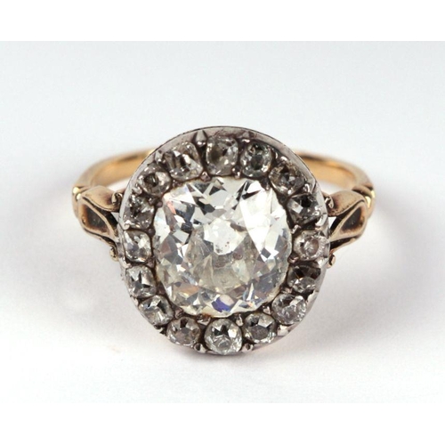 658 - A yellow metal mounted diamond ring with central old cut diamond surrounded by fifteen smaller diamo... 