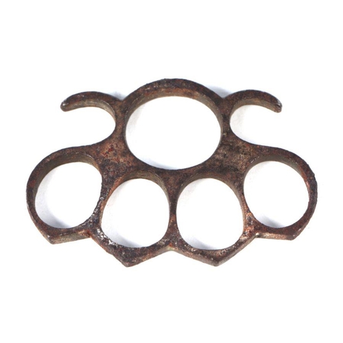 67 - A steel knuckle duster, 10cms wide.