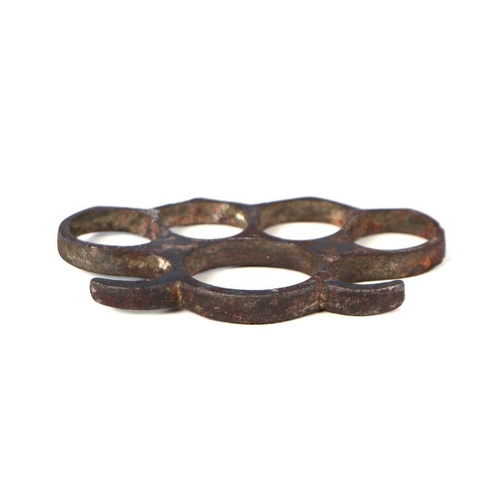 67 - A steel knuckle duster, 10cms wide.