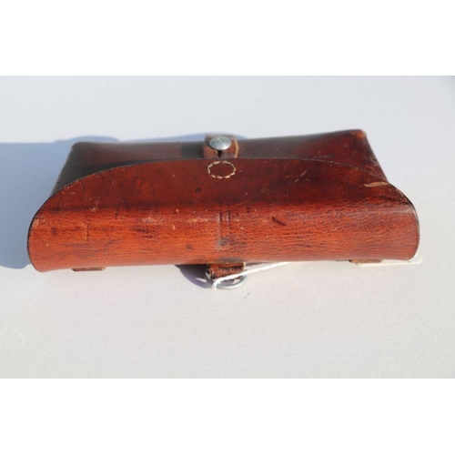 73 - Swiss Army leather ammunition pouch or cartridge case 22.5cms (8.875ins) wide, stamped to the revers... 