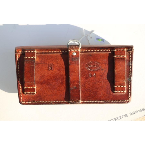 73 - Swiss Army leather ammunition pouch or cartridge case 22.5cms (8.875ins) wide, stamped to the revers... 