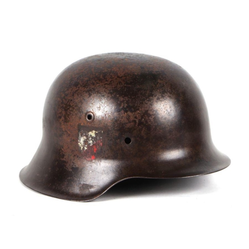 77 - A Nazi German M42 helmet with partial decals. Stamped to the inside of reverse of helmet NS64 0451 (... 